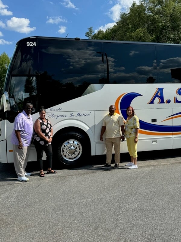 Al Spence with his bus