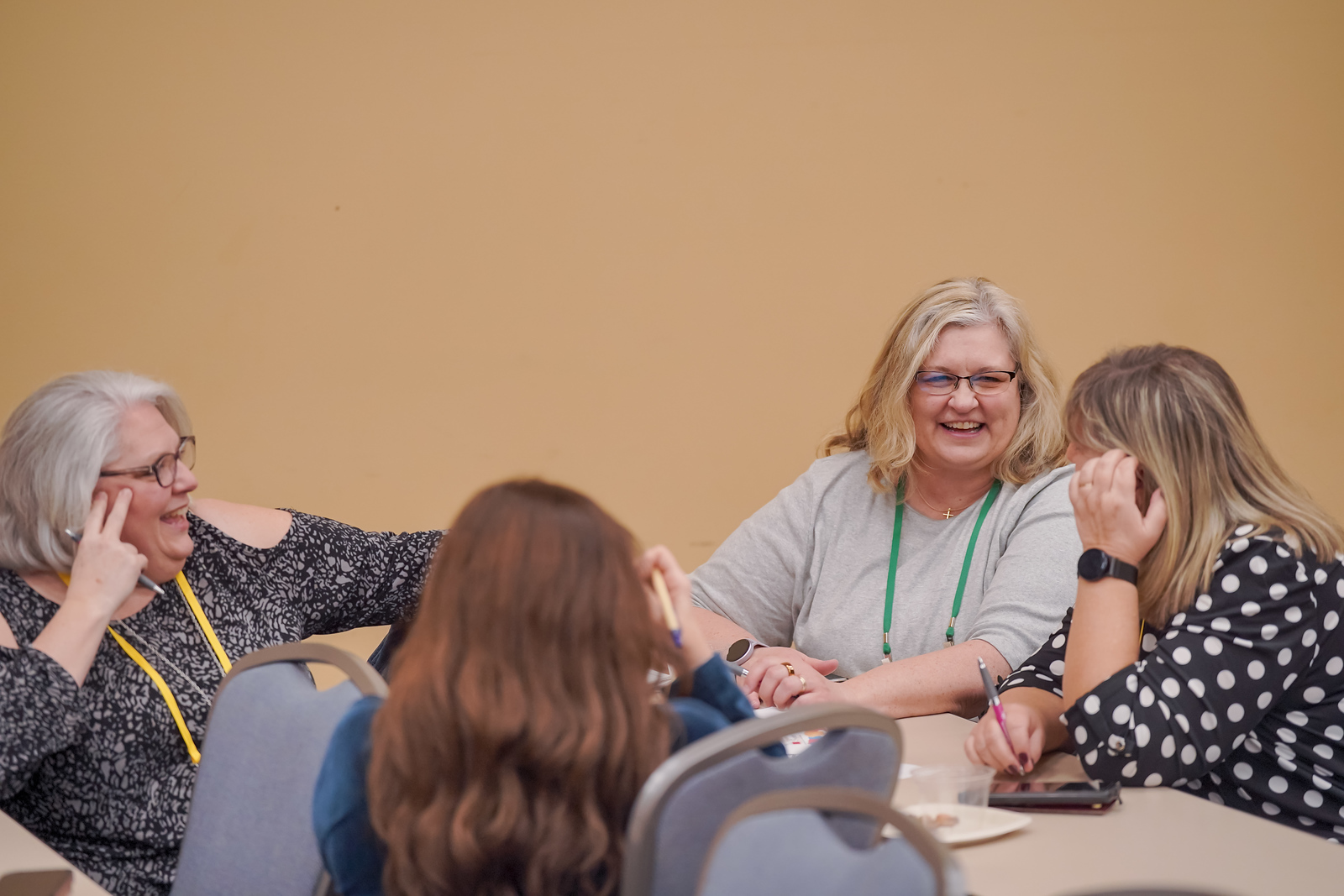 WIB Day 2025 attendees chatting during an activity